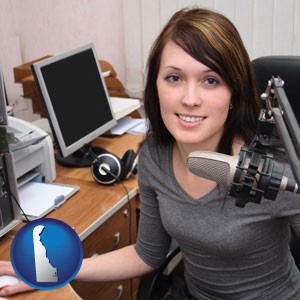a female radio announcer - with Delaware icon